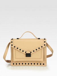 Luxuriously smooth leather with contrasting dome studs in a versatile, multi-compartment design.Top handle, 2½ dropDetachable adjustable shoulder strap, 14½-20¼ dropPush-lock flap closureThree inner compartmentsTwo open pockets under flapFour credit card slotsCotton lining11½W X 9H X 3DImported Luxuriously smooth leather with contrasting dome studs in a versatile, multi-compartment design.Top handle, 2½ dropDetachable adjustable shoulder strap, 14½-20¼ dropPush-lock flap closureThree inner compartmentsTwo open pockets under flapFour credit card slotsCotton lining11½W X 9H X 3DImported