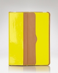 We love Rebecca Minkoff's bold, trend-right accessories, and this neon iPad easel is a perfect example of the look. Use it to upgrade your style status. We love Rebecca Minkoff's bold, trend-right accessories, and this neon iPad easel is a perfect example of the look. Use it to upgrade your style status.