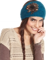 Chic, sophisticated and effortlessly on-trend, this knit headwrap from David & Young is exquisitely embellished with beads and feathers in a flirty floral design. Chic, sophisticated and effortlessly on-trend, this knit headwrap from David & Young is exquisitely embellished with beads and feathers in a flirty floral design.