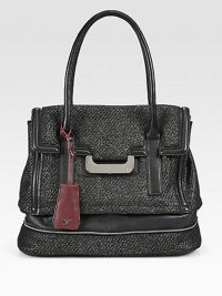 Add just the perfect amount of shine with this metallic tweed style accented with luxurious leather.Double leather top handles, 8 dropMagnetic snap flap closureOne outside snap pocketExpandable zip bottomProtective metal feetThree inner compartmentsOne inside zip pocketTwo inside open pocketsOne pen holderFully lined15W X 12H X 6¾DImported Add just the perfect amount of shine with this metallic tweed style accented with luxurious leather.Double leather top handles, 8 dropMagnetic snap flap closureOne outside snap pocketExpandable zip bottomProtective metal feetThree inner compartmentsOne inside zip pocketTwo inside open pocketsOne pen holderFully lined15W X 12H X 6¾DImported