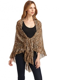 THE LOOKAllover leopard printTie at hemRuffles hemTHE FITAbout 20 from shoulder to hemTHE MATERIALPolyesterCARE & ORIGINDry cleanImported THE LOOKAllover leopard printTie at hemRuffles hemTHE FITAbout 20 from shoulder to hemTHE MATERIALPolyesterCARE & ORIGINDry cleanImported