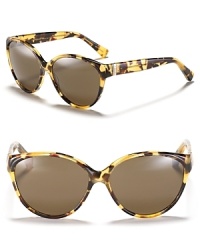 Make a statement in colorful ombré cat eye sunglasses from Yves Saint Laurent. Make a statement in colorful ombré cat eye sunglasses from Yves Saint Laurent.