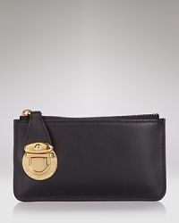 A luxe leather key pouch with logo-stamped pushlock closure from Marc Jacobs. A luxe leather key pouch with logo-stamped pushlock closure from Marc Jacobs.
