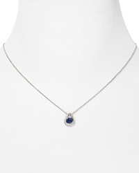 Elegant in its simplicity: delicate cubic zirconia stones surround a specially cut sapphire stone on this sterling silver Crislu pendant necklace - so perfect as a glittering final touch. Elegant in its simplicity: delicate cubic zirconia stones surround a specially cut sapphire stone on this sterling silver Crislu pendant necklace - so perfect as a glittering final touch.