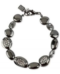 An elegant addition. This bracelet from Robert Lee Morris, crafted from hematite-tone mixed metal, dazzles with glass pave crystal accents adding a lustrous touch. Approximate length: 7-1/2 inches. An elegant addition. This bracelet from Robert Lee Morris, crafted from hematite-tone mixed metal, dazzles with glass pave crystal accents adding a lustrous touch. Approximate length: 7-1/2 inches.