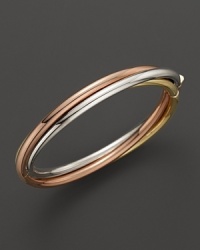 A classic bangle in 18K yellow, rose and white golds. From Roberto Coin. A classic bangle in 18K yellow, rose and white golds. From Roberto Coin.