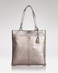 The latest Cole Haan tote works subtle structure with space to spare, so throw it in. This bag is designed to fit your laptop, heels, and so much more. The latest Cole Haan tote works subtle structure with space to spare, so throw it in. This bag is designed to fit your laptop, heels, and so much more.