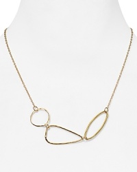 Cool, clustered discs are an understated, yet perfectly sculptural accent on this minimalist piece, styled in gold plated metal. From Gorjana. Cool, clustered discs are an understated, yet perfectly sculptural accent on this minimalist piece, styled in gold plated metal. From Gorjana.
