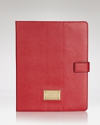 Saffiano leather is a sophisticated statement on this MICHAEL Michael Kors iPad case, which is secured by a snap closure. Saffiano leather is a sophisticated statement on this MICHAEL Michael Kors iPad case, which is secured by a snap closure.