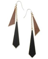 Fierce fashion from GUESS. Snake skin textures in tan and jet create biting style on these double drop earrings. Crafted in gold tone mixed metal. Approximate drop: 3-1/2 inches. Fierce fashion from GUESS. Snake skin textures in tan and jet create biting style on these double drop earrings. Crafted in gold tone mixed metal. Approximate drop: 3-1/2 inches.