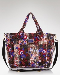 A bold wallpaper floral print is an eye-catching touch on this ever-practical baby bag from MARC BY MARC JACOBS. Crafted from durable nylon with pockets for bottles, bibs, and burp cloths, it's a cool mom's carryall. A bold wallpaper floral print is an eye-catching touch on this ever-practical baby bag from MARC BY MARC JACOBS. Crafted from durable nylon with pockets for bottles, bibs, and burp cloths, it's a cool mom's carryall.