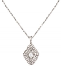 Classic elegance. This necklace from Carolee is crafted from silver-tone mixed metal with a pendant prominently featuring a glass pearl adorned by glass stones for a lustrous touch. Approximate length: 17 inches. Approximate drop: 1/8 inch. Classic elegance. This necklace from Carolee is crafted from silver-tone mixed metal with a pendant prominently featuring a glass pearl adorned by glass stones for a lustrous touch. Approximate length: 17 inches. Approximate drop: 1/8 inch.