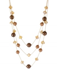 Style comes in layers in this illusion necklace from Kenneth Cole New York. Crafted from gold-tone mixed metal, the necklace is draped with brown glass pearls and beads for a visually stunning effect. Item comes packaged in a signature Kenneth Cole New York Gift Box. Approximate length: 16 inches + 3-inch extender. Approximate drop: 3 inches. Style comes in layers in this illusion necklace from Kenneth Cole New York. Crafted from gold-tone mixed metal, the necklace is draped with brown glass pearls and beads for a visually stunning effect. Item comes packaged in a signature Kenneth Cole New York Gift Box. Approximate length: 16 inches + 3-inch extender. Approximate drop: 3 inches.