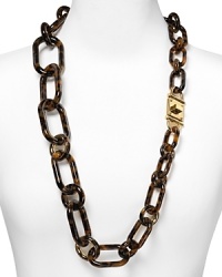 Timeless glamor is a hallmark of the Michael Kors brand. Make the look your new signature with this classically styled tortoise shell link necklace. Timeless glamor is a hallmark of the Michael Kors brand. Make the look your new signature with this classically styled tortoise shell link necklace.
