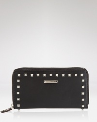 Effortlessly practical with an edge. Rebecca Minkoff crafts another it-girl must-have, this time in studded leather with ample essential-organizing pockets. Effortlessly practical with an edge. Rebecca Minkoff crafts another it-girl must-have, this time in studded leather with ample essential-organizing pockets.