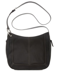 Take this fabulously functional Tignanello design with you wherever your adventures may lead. Supple leather, silver-tone hardware and detail stitching add instant panache, while the convenient crossbody strap keeps hands free when you're on the move. Take this fabulously functional Tignanello design with you wherever your adventures may lead. Supple leather, silver-tone hardware and detail stitching add instant panache, while the convenient crossbody strap keeps hands free when you're on the move.