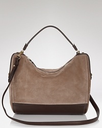 Tap this season's textured craze with this mixed media bag from Salvatore Ferragamo. Crafted of suede and trimmed in leather, it's a chic way to carry a major trend. Tap this season's textured craze with this mixed media bag from Salvatore Ferragamo. Crafted of suede and trimmed in leather, it's a chic way to carry a major trend.