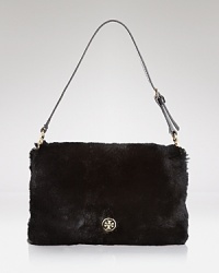 This Tory Burch clutch does evening with an edge. Crafted of rabbit fur with leather trims, it's a look-maker after-hours. This Tory Burch clutch does evening with an edge. Crafted of rabbit fur with leather trims, it's a look-maker after-hours.