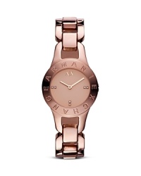 Armani Exchange perfects sleek style with this slim-profile watch. If understated, it's logo-engraved bezel and inset crystals lend fashion-forward flair. Armani Exchange perfects sleek style with this slim-profile watch. If understated, it's logo-engraved bezel and inset crystals lend fashion-forward flair.