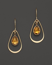 Bezeled citrine teardrops, framed in 14K yellow gold. Bezeled citrine teardrops, framed in 14K yellow gold.