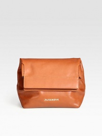 Supple leather fold-over style is unique and perfect for your essentials.Hand-held styleMagnetic snap closureTwo inside open pockets7W X 11½H X 4½DMade in Italy Supple leather fold-over style is unique and perfect for your essentials.Hand-held styleMagnetic snap closureTwo inside open pockets7W X 11½H X 4½DMade in Italy