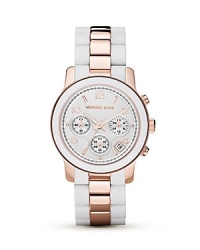 Fresh white is warmed up with shining rose gold in this ultra chic timepiece with three-eye functionality from MICHAEL Michael Kors. Fresh white is warmed up with shining rose gold in this ultra chic timepiece with three-eye functionality from MICHAEL Michael Kors.