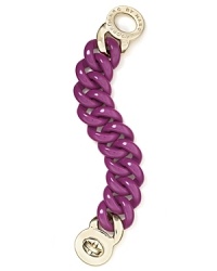 Hit the links with this boldly sized bracelet from MARC BY MARC JACOBS. Crafted from acrylic and accented by the brand's signature silver turn lock, it's a haute piece of fashion hardware. Hit the links with this boldly sized bracelet from MARC BY MARC JACOBS. Crafted from acrylic and accented by the brand's signature silver turn lock, it's a haute piece of fashion hardware.