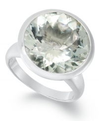 Cocktail ring - a must! Every girl needs a sparkler in her collection, and this round-cut green quartz (8-3/4 ct. t.w.) ring is just the ticket. Set in sterling silver. Size 7. Cocktail ring - a must! Every girl needs a sparkler in her collection, and this round-cut green quartz (8-3/4 ct. t.w.) ring is just the ticket. Set in sterling silver. Size 7.