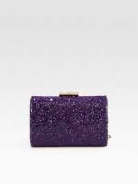 This boxy style sparkles with textured glitter fabric; perfect for a night out.Hinged top clasp closureSatin lining5½W X 3½H X 2½DMade in Italy This boxy style sparkles with textured glitter fabric; perfect for a night out.Hinged top clasp closureSatin lining5½W X 3½H X 2½DMade in Italy