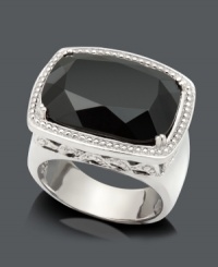Get ready for an evening out on the town with this bold statement ring. Crafted in sterling silver with an intricate side design, a large cushion-cut onyx (13 x 8 mm) serves as the focal point. Size 7. Get ready for an evening out on the town with this bold statement ring. Crafted in sterling silver with an intricate side design, a large cushion-cut onyx (13 x 8 mm) serves as the focal point. Size 7.