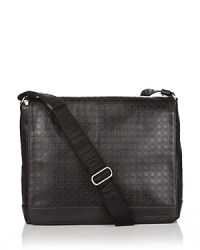 Messenger bag with gancini embossed all over. Plain bottom strip on bottom with Ferragamo signature embedded. Adjustable strap. Zip pocket inside. Messenger bag with gancini embossed all over. Plain bottom strip on bottom with Ferragamo signature embedded. Adjustable strap. Zip pocket inside.