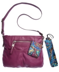 Laid-back yet ready for adventure, this take-anywhere crossbody by Tyler Rodan is the perfect partner. Outfitted with signature hardware, detail stitching and plenty of pockets, it's ultimate accessory for any on-the-go style. Includes complementary coin purse and umbrella. Laid-back yet ready for adventure, this take-anywhere crossbody by Tyler Rodan is the perfect partner. Outfitted with signature hardware, detail stitching and plenty of pockets, it's ultimate accessory for any on-the-go style. Includes complementary coin purse and umbrella.