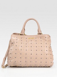 Smooth leather design with allover metal studs in a top-zip carryall. Double top handles, 5¾ dropRemovable, adjustable shoulder strap, 15¾-18 dropTop zip and snap closureOne inside compartmentOne inside zipper pocketThree inside open pocketsSatin lining13¾W X 10¾H X 1¾DMade in Italy Smooth leather design with allover metal studs in a top-zip carryall. Double top handles, 5¾ dropRemovable, adjustable shoulder strap, 15¾-18 dropTop zip and snap closureOne inside compartmentOne inside zipper pocketThree inside open pocketsSatin lining13¾W X 10¾H X 1¾DMade in Italy