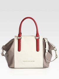 A roomy shape of paneled butter-soft leather with a versatile strap. Double top handles, 6 dropAdjustable detachable shoulder strap, 14½-17 dropTop zip closureOne inside zip pocketTwo inside open pocketsLogo-printed lining21W X 10H X 7½DImported A roomy shape of paneled butter-soft leather with a versatile strap. Double top handles, 6 dropAdjustable detachable shoulder strap, 14½-17 dropTop zip closureOne inside zip pocketTwo inside open pocketsLogo-printed lining21W X 10H X 7½DImported