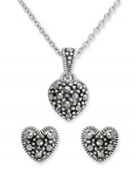 Petite sparkle makes a symbolic statement on Genevieve & Grace's pretty jewelry set. Crafted in sterling silver, tiny hearts glitter with marcasite as decoration. Approximate length: 18 inches. Approximate drop length (pendant): 1/2 inch. Approximate drop width (pendant): 5/16 inch. Approximate diameter (earrings): 5/16 inch. Petite sparkle makes a symbolic statement on Genevieve & Grace's pretty jewelry set. Crafted in sterling silver, tiny hearts glitter with marcasite as decoration. Approximate length: 18 inches. Approximate drop length (pendant): 1/2 inch. Approximate drop width (pendant): 5/16 inch. Approximate diameter (earrings): 5/16 inch.