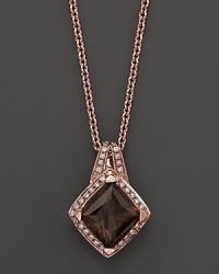 Pavé diamonds frame a glittering smoky quartz set in 18K pink gold. 18K pink gold chain. Pavé diamonds frame a glittering smoky quartz set in 18K pink gold. 18K pink gold chain.