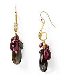 A cluster of garnet and smokey quartz stones dress up this pair of Alexis Bittar earrings, which are accented by an ornate, crystal bedecked setting. A cluster of garnet and smokey quartz stones dress up this pair of Alexis Bittar earrings, which are accented by an ornate, crystal bedecked setting.