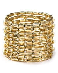 Nail this season's eclectic jewelry trend with coil bracelet from Cara. Decorated with layers of gold stones, this bohemian piece will work just as well for day as for night. Nail this season's eclectic jewelry trend with coil bracelet from Cara. Decorated with layers of gold stones, this bohemian piece will work just as well for day as for night.
