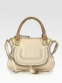 EXCLUSIVELY AT SAKS in Metallic Beige. Shimmering metallic calfskin leather covers this versatile shape, accented with elegantly-wrapped top handles in a contrasting tone. Double tennis-wrapped top handles, 6 dropShoulder strap, 18 dropTop zip closureHidden pocket under flapOne inside zip pocketOne inside open pocketCotton lining14½W X 10¾H X 4½DMade in Italy EXCLUSIVELY AT SAKS in Metallic Beige. Shimmering metallic calfskin leather covers this versatile shape, accented with elegantly-wrapped top handles in a contrasting tone. Double tennis-wrapped top handles, 6 dropShoulder strap, 18 dropTop zip closureHidden pocket under flapOne inside zip pocketOne inside open pocketCotton lining14½W X 10¾H X 4½DMade in Italy