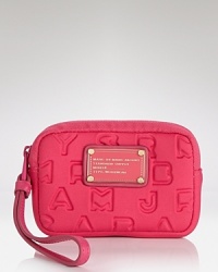 Color pop and lock it with this electrically-charged phone case from MARC BY MARC JACOBS, in durable neoprene embossed with the label's signature lettering. Color pop and lock it with this electrically-charged phone case from MARC BY MARC JACOBS, in durable neoprene embossed with the label's signature lettering.