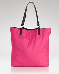 MARC BY MARC JACOBS proves that two bags are better than one with this reversible nylon tote. Boasting a flip-flop friendly silhouette, it's perfect for the indecisive ingenue. MARC BY MARC JACOBS proves that two bags are better than one with this reversible nylon tote. Boasting a flip-flop friendly silhouette, it's perfect for the indecisive ingenue.