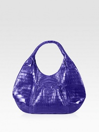 Luxurious crocodile skin in a roomy carryall, perfectly sized for all your essentials.Double shoulder straps, 8½ dropMagnetic top closureTwo outside open pocketsOne inside zip pocketOne inside open pocketSuede lining17½W X 11H X 3½DImported Luxurious crocodile skin in a roomy carryall, perfectly sized for all your essentials.Double shoulder straps, 8½ dropMagnetic top closureTwo outside open pocketsOne inside zip pocketOne inside open pocketSuede lining17½W X 11H X 3½DImported