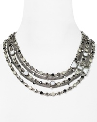 This charming MARC BY MARC JACOBS necklace is the perfect mix of sweet and sass, crafted of hard-hitting metal chains and detailed by a feminine bow. This charming MARC BY MARC JACOBS necklace is the perfect mix of sweet and sass, crafted of hard-hitting metal chains and detailed by a feminine bow.