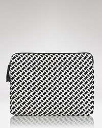 Hit print with this neoprene laptop case from DIANE von FURSTENBERG, striking in the label's signature graphics. Hit print with this neoprene laptop case from DIANE von FURSTENBERG, striking in the label's signature graphics.