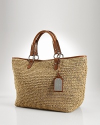 With a classic shape and rich details, this woven tote from Lauren Ralph Lauren epitomizes low-key luxury. Ideally sized for the vacation essentials, this style is set for your next jet jaunt. With a classic shape and rich details, this woven tote from Lauren Ralph Lauren epitomizes low-key luxury. Ideally sized for the vacation essentials, this style is set for your next jet jaunt.