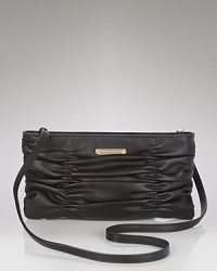 Rich ruched leather is glazed and washed for a soft, luxe texture. Gold-toned hardware and a removable crossbody strap set the scene for a party-perfect look. Rich ruched leather is glazed and washed for a soft, luxe texture. Gold-toned hardware and a removable crossbody strap set the scene for a party-perfect look.