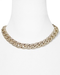 Rough cut chain links get a glittering update on this Rebecca Minkoff necklace, which works an edgy glamour finished in gold plated metal. Rough cut chain links get a glittering update on this Rebecca Minkoff necklace, which works an edgy glamour finished in gold plated metal.