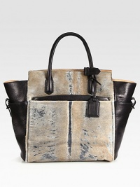 Luxurious, two-tone haircalf & pebbled leather in a roomy top-handle carryall, perfectly sized for all your essentials.Double top handles, 5½ dropToggle strap closureFour outside open pocketsOne detachable zip pouchTwo inside zip pocketsCotton lining12¾W X 13¾H X 4½DImported Luxurious, two-tone haircalf & pebbled leather in a roomy top-handle carryall, perfectly sized for all your essentials.Double top handles, 5½ dropToggle strap closureFour outside open pocketsOne detachable zip pouchTwo inside zip pocketsCotton lining12¾W X 13¾H X 4½DImported