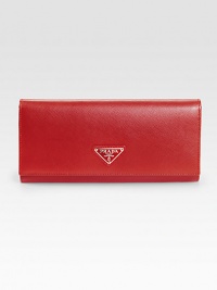 Timeless flap design in neutral hued saffiano calfskin.Snap flap closure Polished steel hardware Enamel triangle logo One outside zip pocket Center coin compartment with zipper Two bill compartments Ten credit card slots Calfskin lining 7W X 4H X 1D Made in Italy Timeless flap design in neutral hued saffiano calfskin.Snap flap closure Polished steel hardware Enamel triangle logo One outside zip pocket Center coin compartment with zipper Two bill compartments Ten credit card slots Calfskin lining 7W X 4H X 1D Made in Italy
