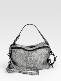 Pebble-grain leather takes on a metallic sheen in this travel-ready zip-top carryall.Adjustable detachable top handle, 4½-8 dropAdjustable detachable shoulder strap, 24-27 dropTop-zip closureOne outside zip pocketOne inside zip pocketFully lined10W X 6H X 3½DImported Pebble-grain leather takes on a metallic sheen in this travel-ready zip-top carryall.Adjustable detachable top handle, 4½-8 dropAdjustable detachable shoulder strap, 24-27 dropTop-zip closureOne outside zip pocketOne inside zip pocketFully lined10W X 6H X 3½DImported